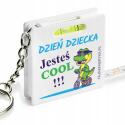Brelok miarka poziomica dinozaur prezent na Dzień Dziecka gadżet dla dzieci z nadrukiem