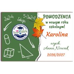 Magnes w folijce z brelokiem i nadrukiem logo...